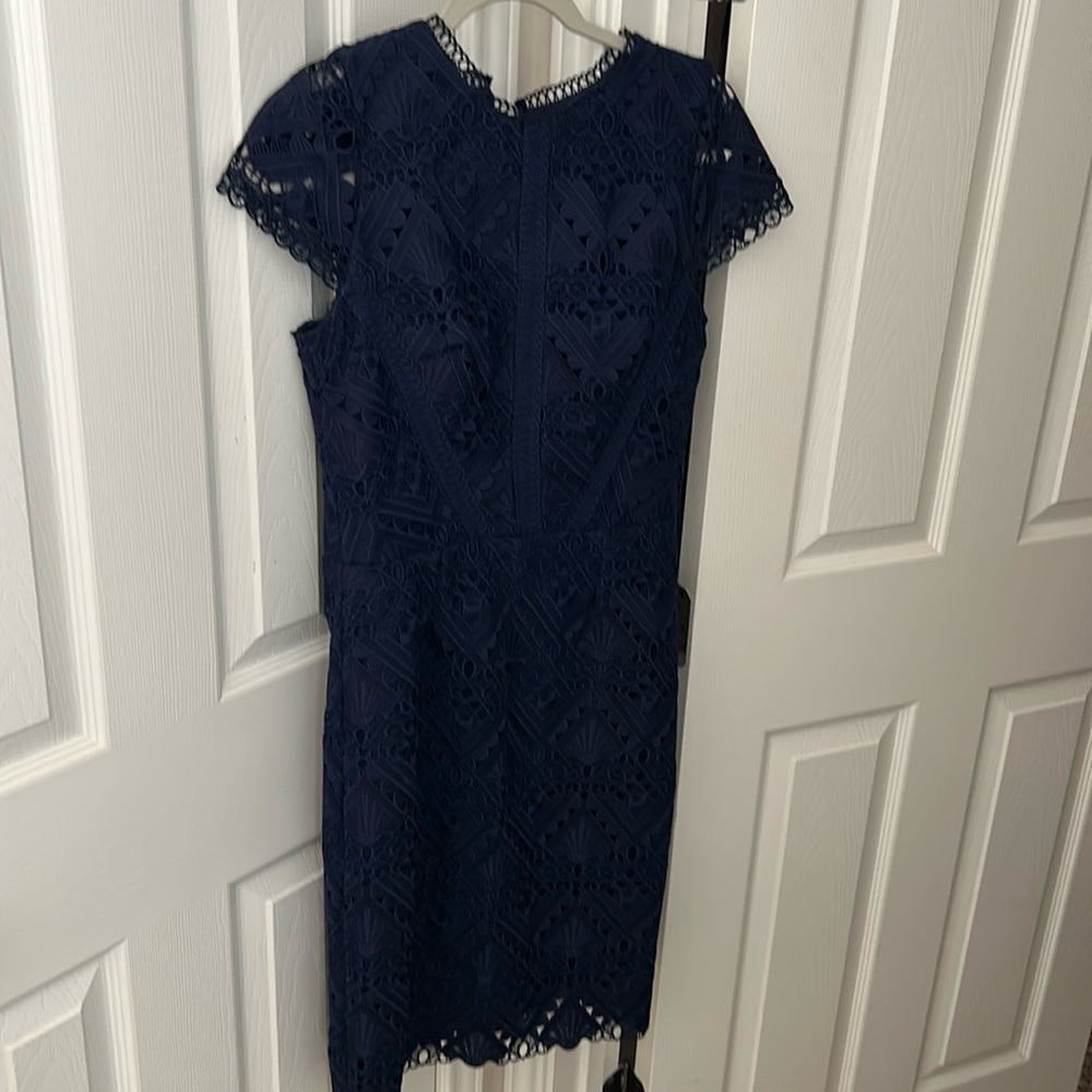 Navy cap sleeved lace dress
